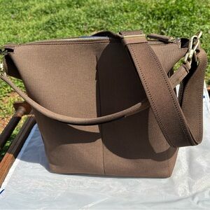 Rothy’s Taupe “The Bucket Bag” with Adjustable Strap and Minimalist Design